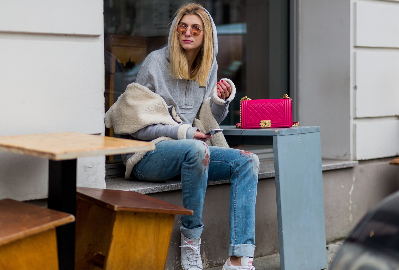 BERLIN, GERMANY - JANUARY 19: Kimyana Hachmann wearing Dior denim jeans, pink Chanel bag, Adidas Stan Smith sneaker, Zara jacket, Dolce & Gabbana hoody, during the Mercedes-Benz Fashion Week Berlin A/W 2017 at Kaufhaus Jandorf on January 19, 2017 in Berlin, Germany. (Photo by Christian Vierig/Getty Images) *** Local Caption *** Kimyana Hachmann