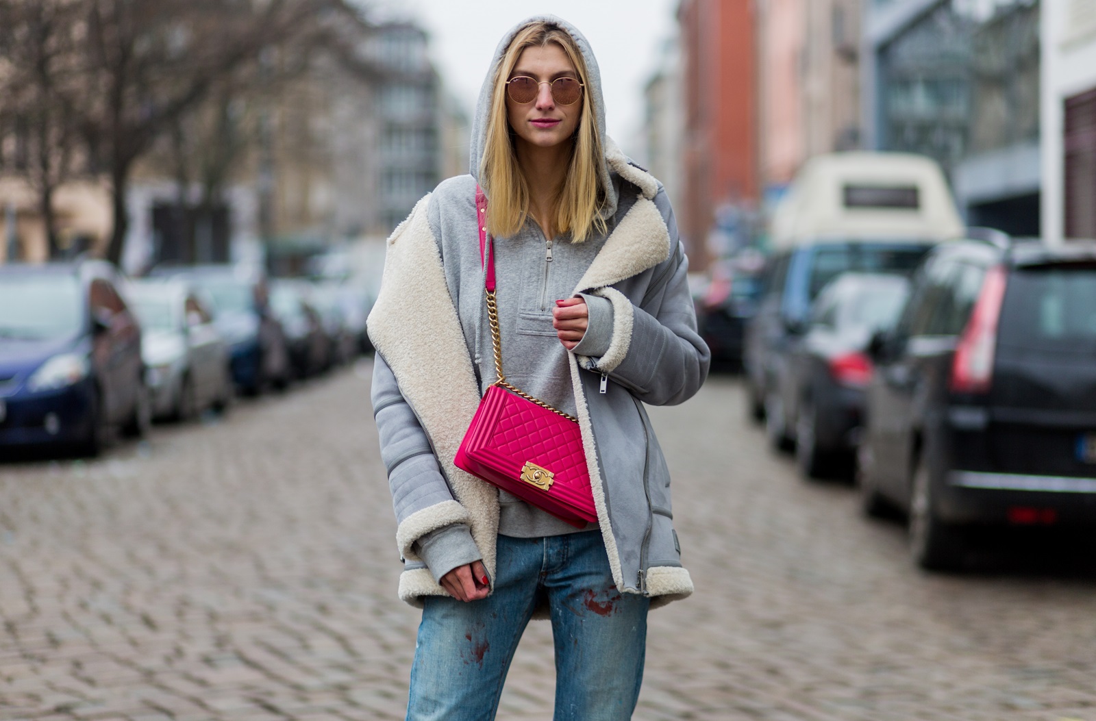 BERLIN, GERMANY - JANUARY 19: Kimyana Hachmann wearing Dior denim jeans, pink Chanel bag, Adidas Stan Smith sneaker, Zara jacket, Dolce & Gabbana hoody, during the Mercedes-Benz Fashion Week Berlin A/W 2017 at Kaufhaus Jandorf on January 19, 2017 in Berlin, Germany. (Photo by Christian Vierig/Getty Images) *** Local Caption *** Kimyana Hachmann